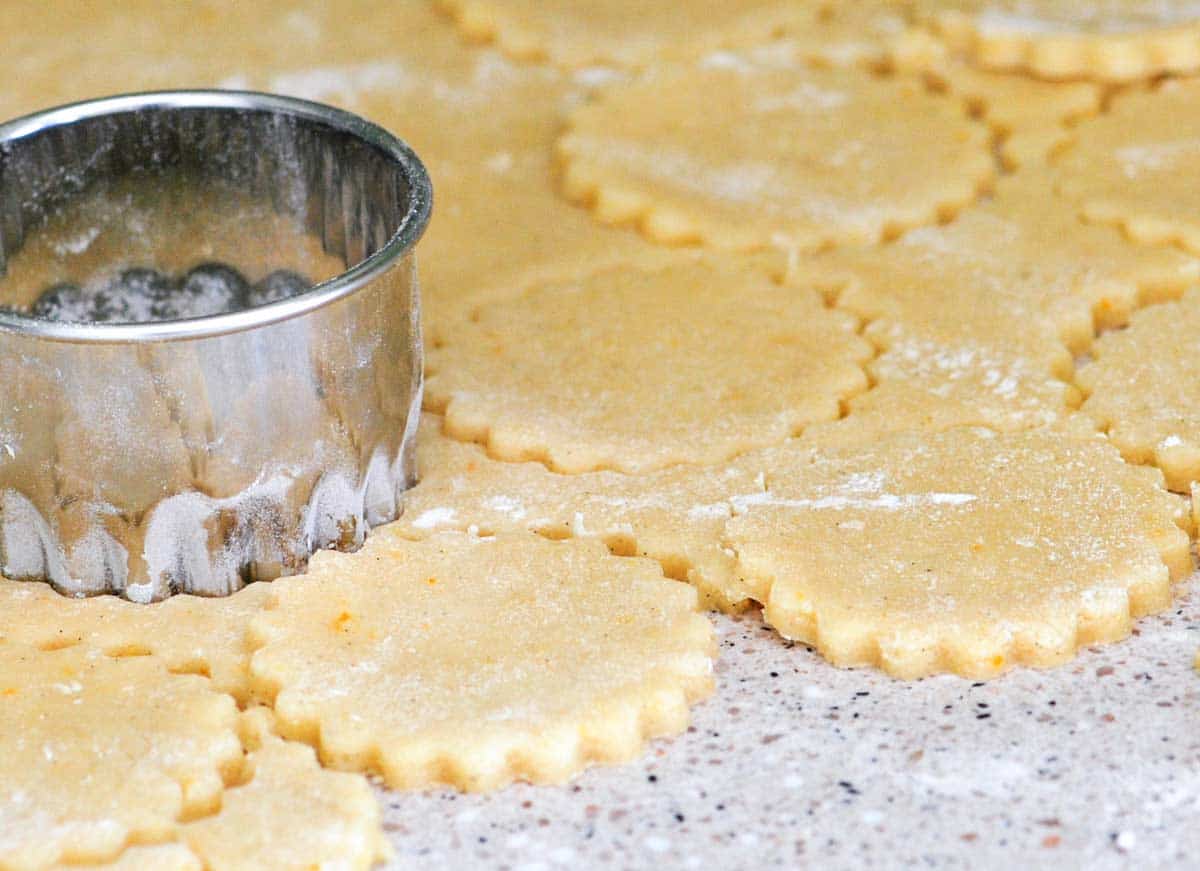 Easy Butter Cookies Recipe Cutting out the butter cookie dough