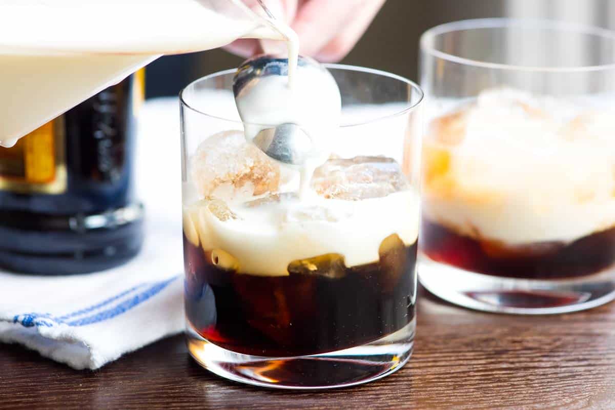 Adding the cream on top with spoon