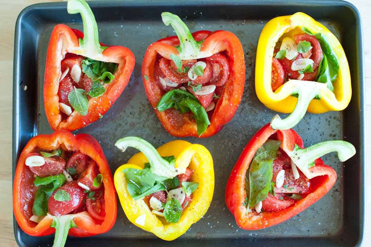 Tomato Basil Stuffed Peppers: Filled pepper halves ready to bake