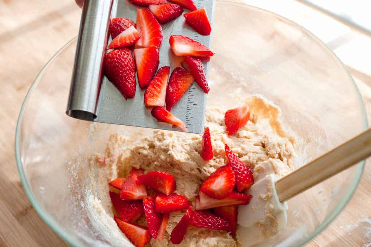 How to Make Strawberry Yogurt Muffins Adding strawberries to the yogurt muffin batter
