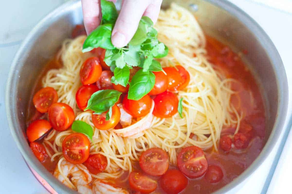 15 Minute Shrimp Pasta Recipe with Tomato and Basil Finishing the tomato basil sauce