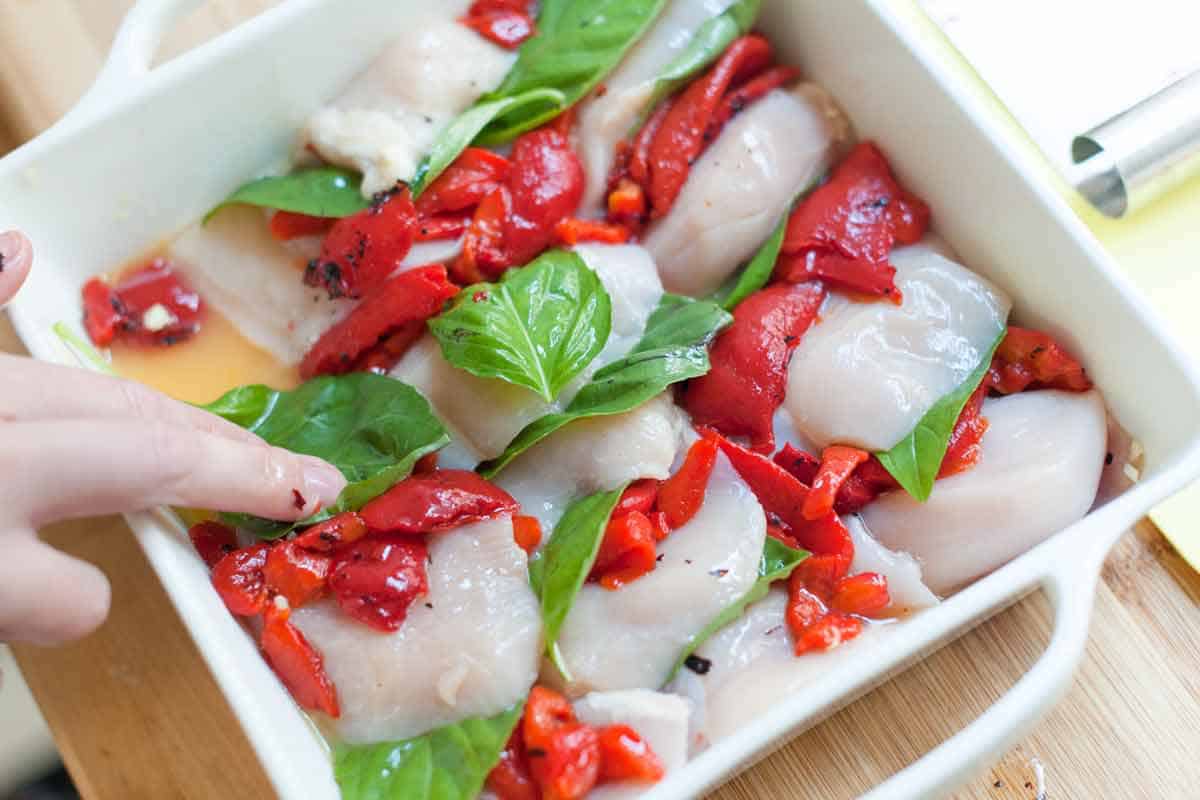 Assembling the casserole dish to bake chicken breast
