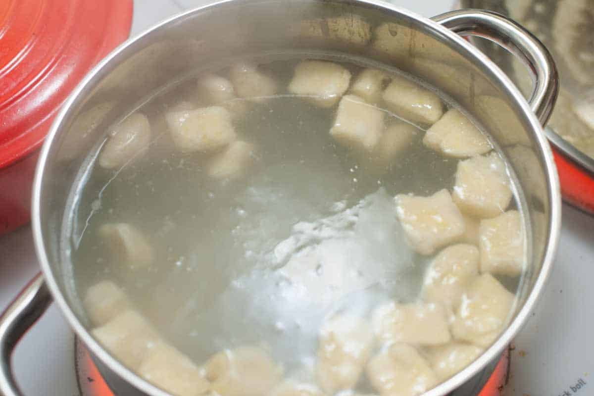 Boiling gnocchi dumplings in salted water
