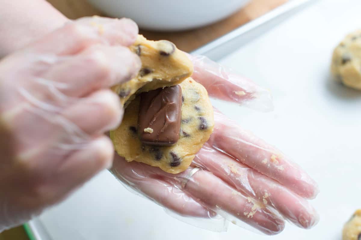Milky Way Stuffed Cookies How to Make Stuffed Cookies: Tucking a mini candy bar into cookie dough