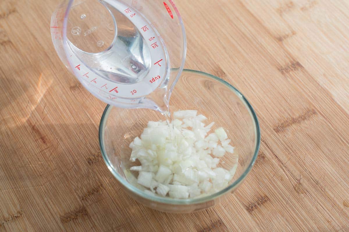Deflaming the onions in cold water.
