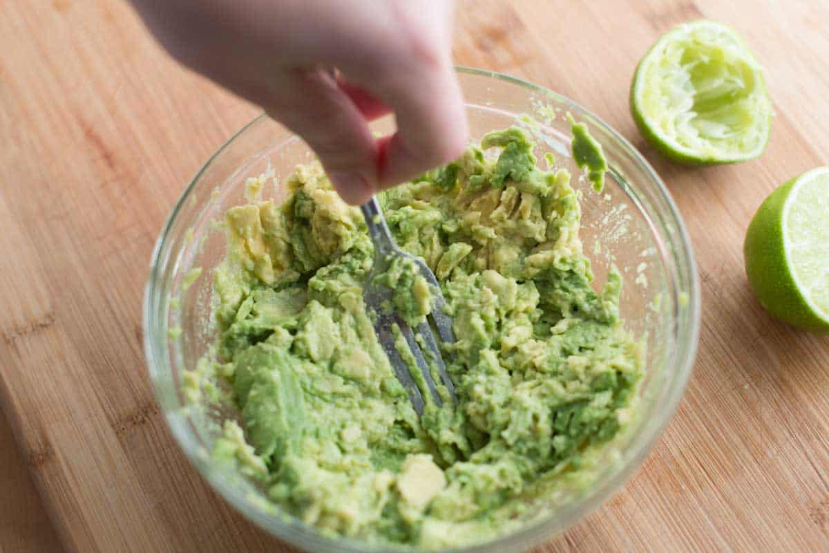 Mashing with a fork to leave some texture.