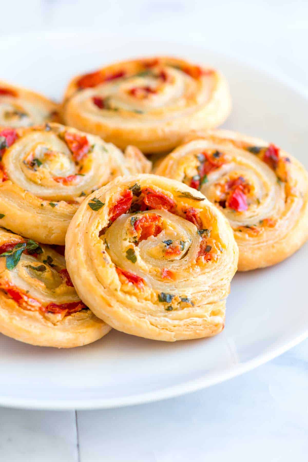 Cheesy Roasted Pepper Pastry Pinwheel Recipe from www.inspiredtaste.net Cheese Pinwheels