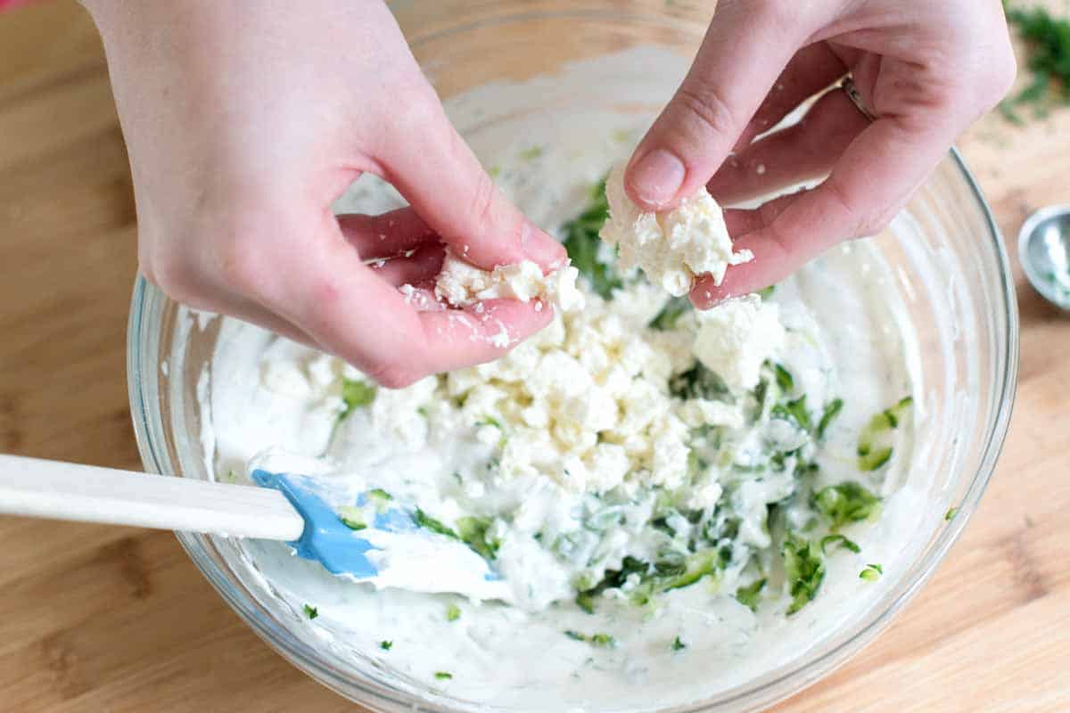 How to Make Feta Tzatziki: Adding the feta cheese to tzatziki