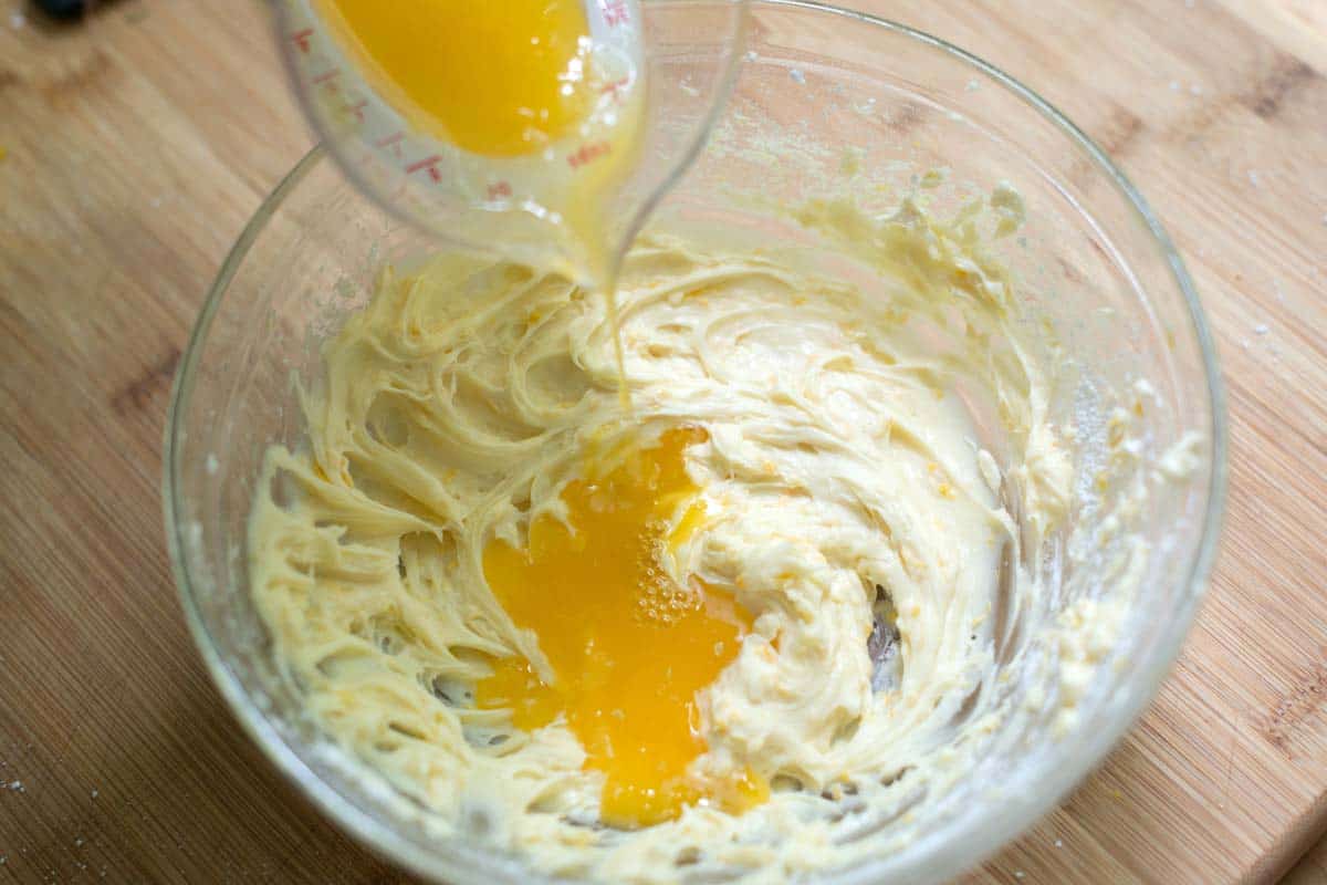 Orange Cream Fruit Dip Making fruit dip by adding orange juice to whipped cream cheese and cream