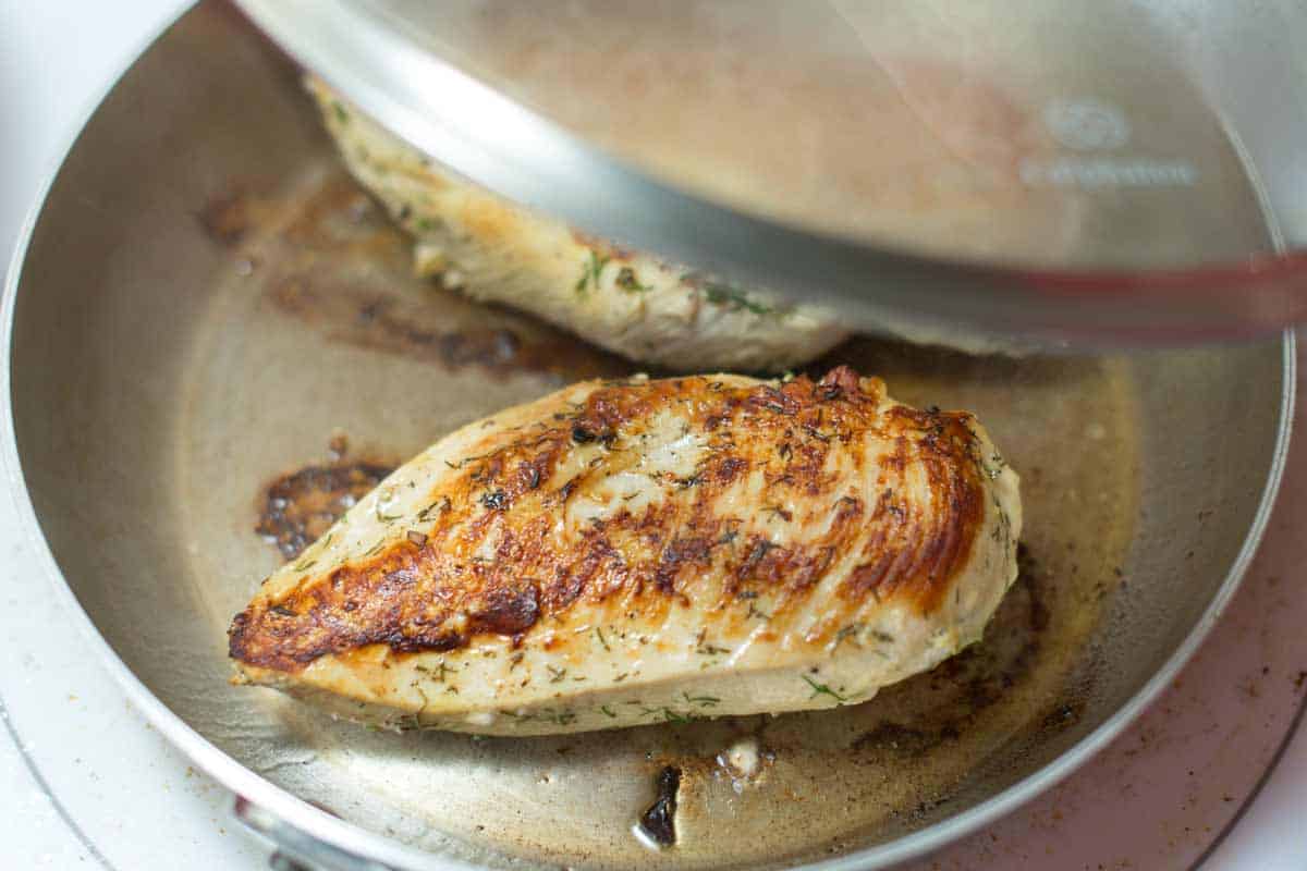 How to Cook Chicken Breasts Searing chicken in a skillet