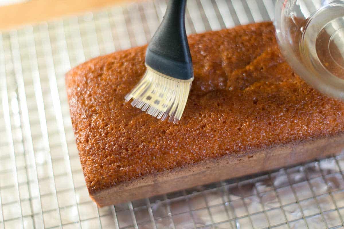How to Make Buttered Rum Pound Cake Adding the rum syrup
