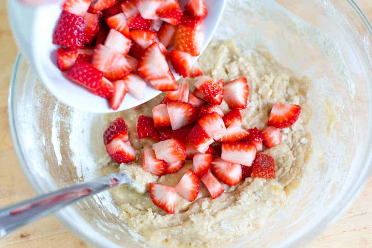 How to Make Perfect Strawberry Muffins Adding the fresh strawberries to muffin batter