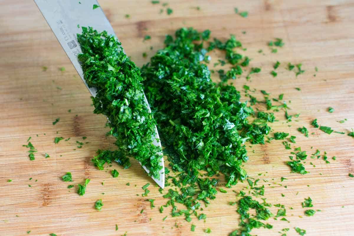 Chopping parsley by hand for chimichurri