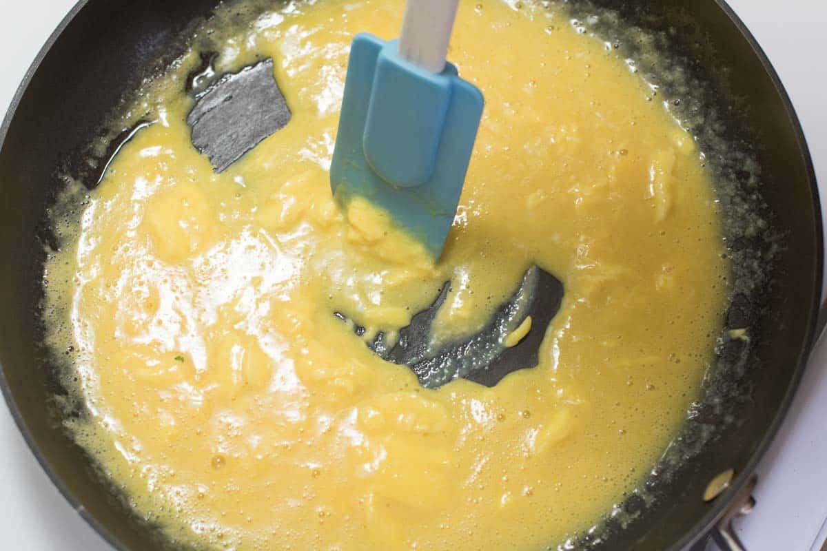 The trick to Inspired Taste's scrambled eggs recipe - Cooking the eggs over low heat in a non-stick skillet.