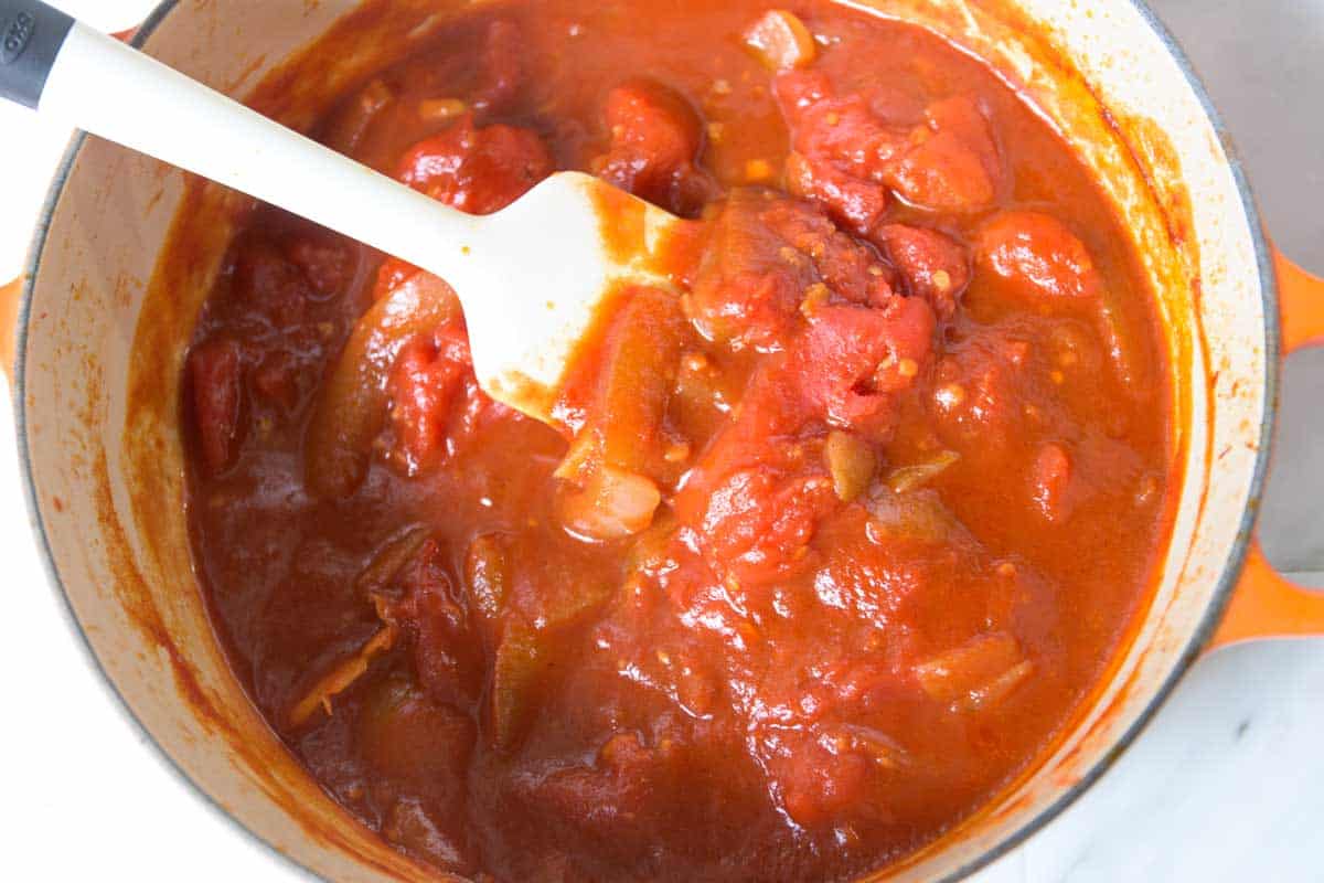 Simmered tomatoes and onions ready to be blended into ketchup
