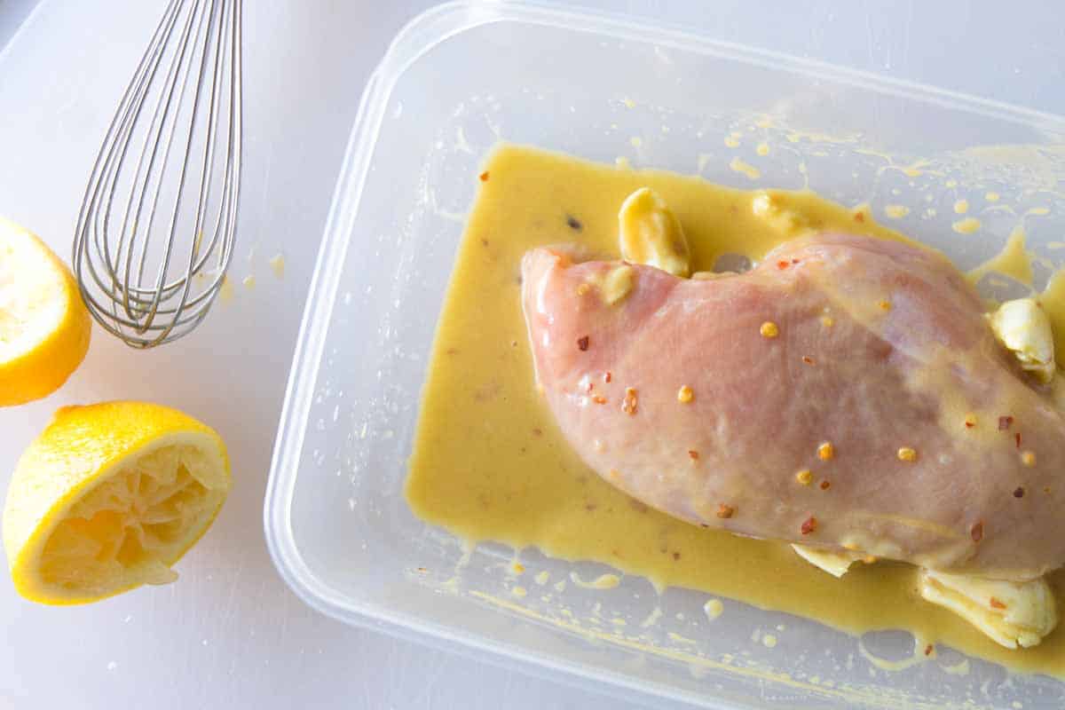 How to Make Healthy Lettuce Wraps with Chicken and Hummus Marinating Honey Dijon Chicken for lettuce wraps