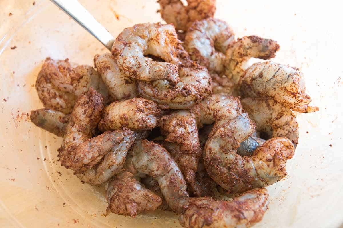 How to Make Shrimp Tacos: Shrimp marinating with the spice mix