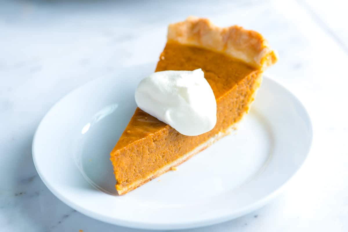 Pumpkin pie with whipped cream on top