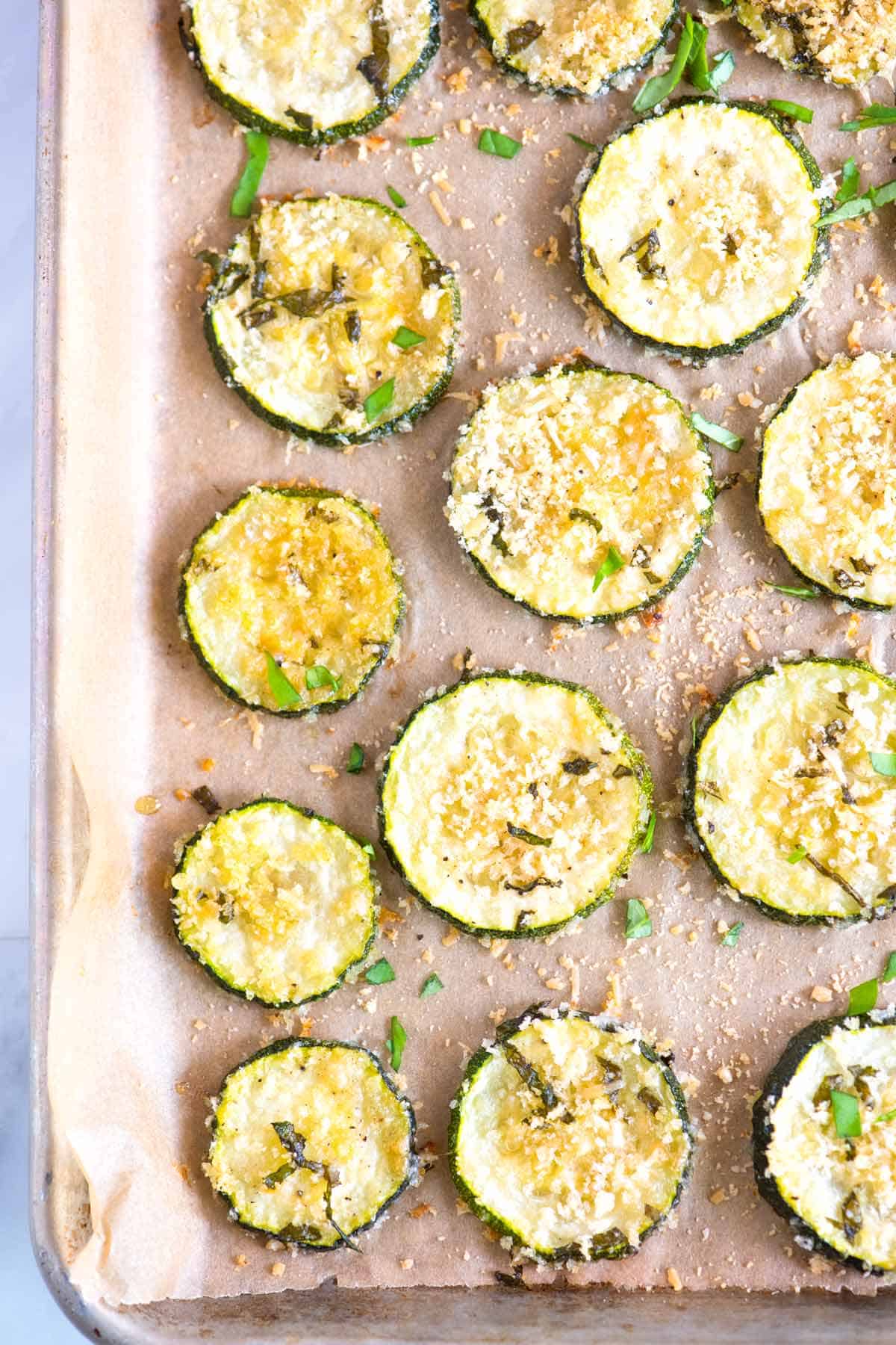 Zucchini chips on baking sheet