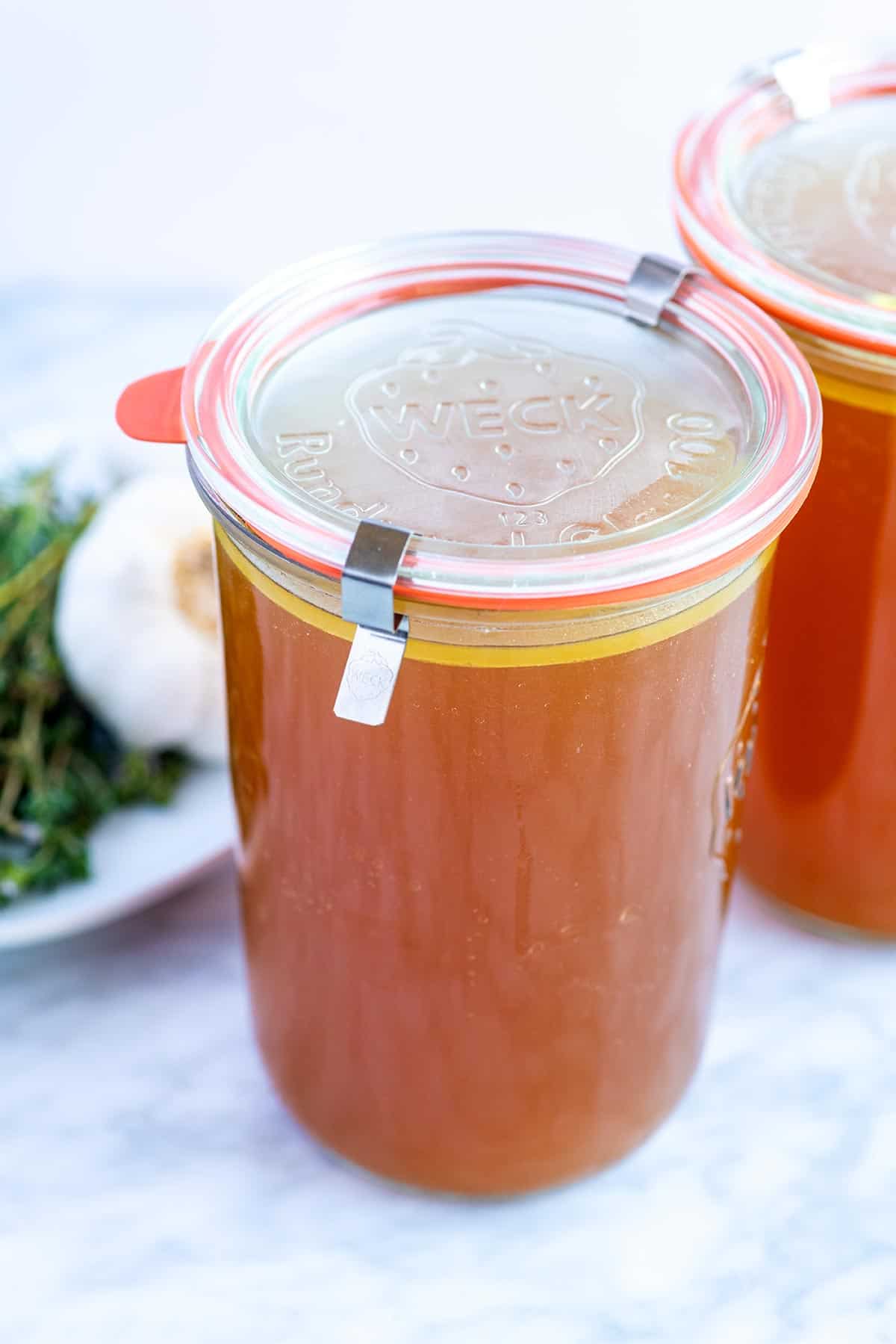 This homemade chicken stock will knock the socks of anything you can buy at the store. Use leftover bones or use chicken parts. Homemade chicken stock