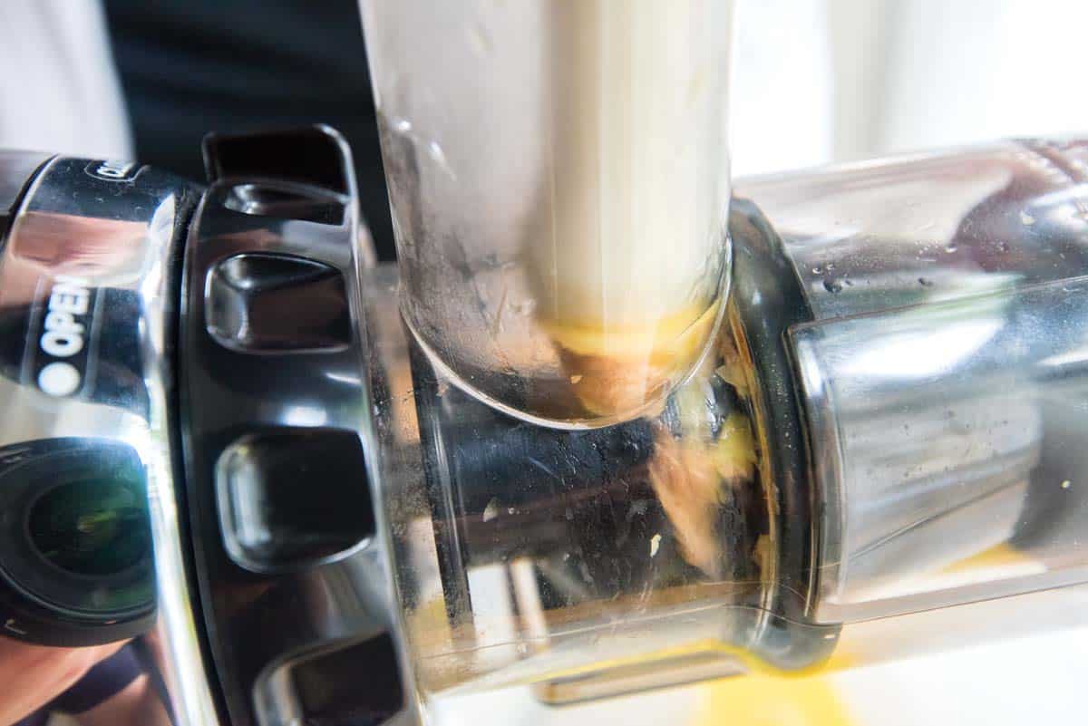 Cold press juicing fresh ginger