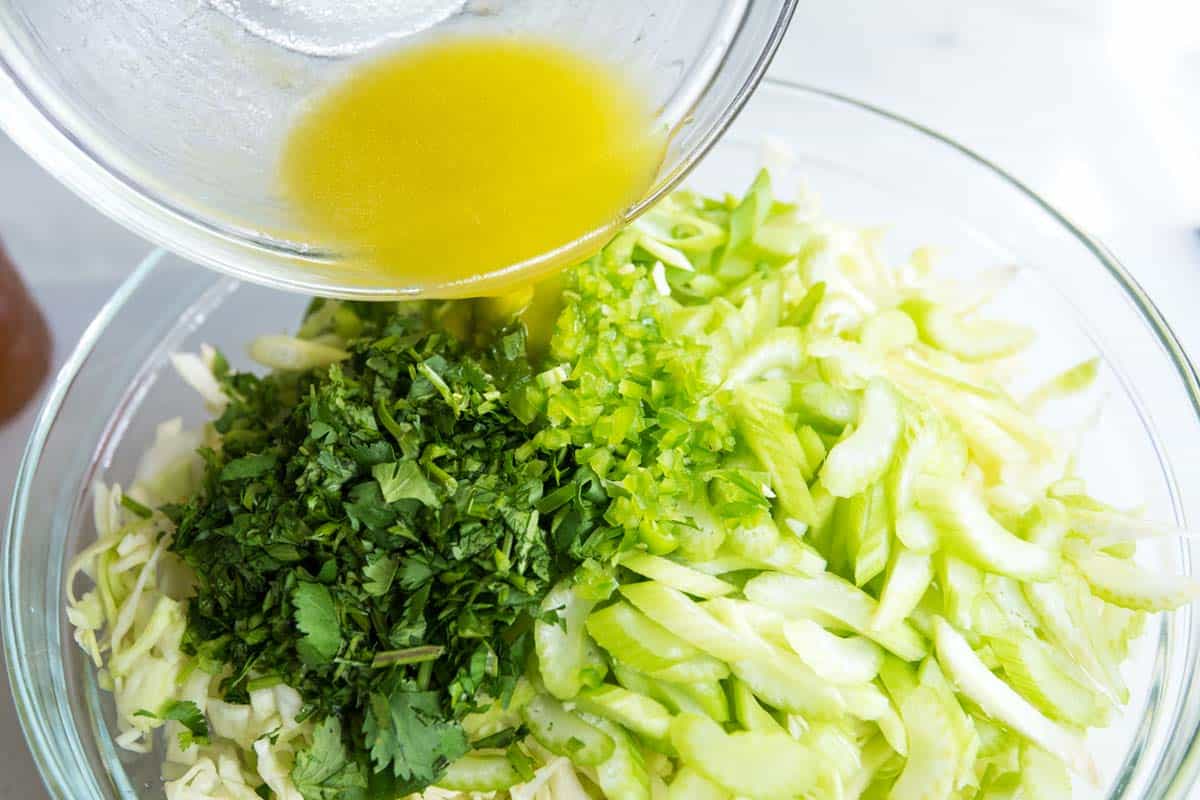 Pouring over the fresh lime dressing