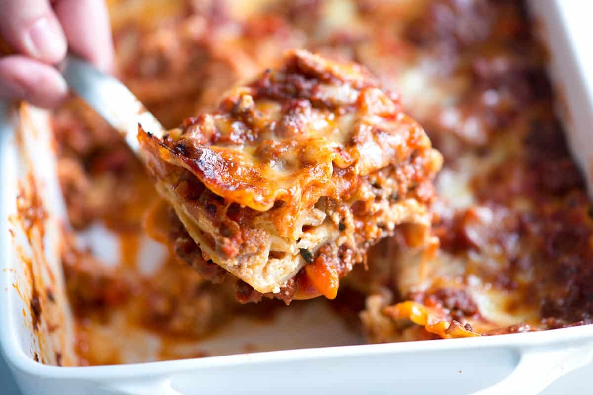 Serving a slice of meat lasagna