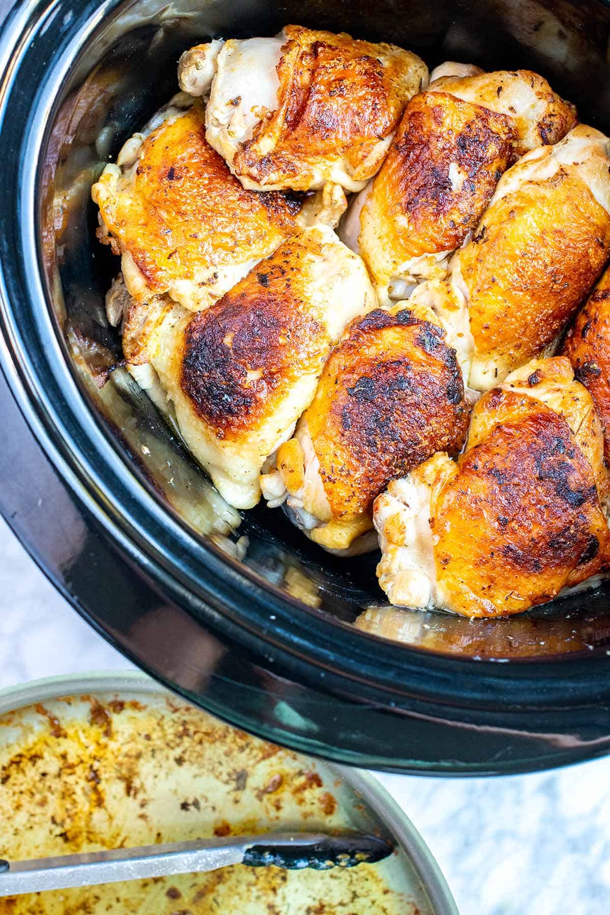 Seared chicken thighs in slow cooker