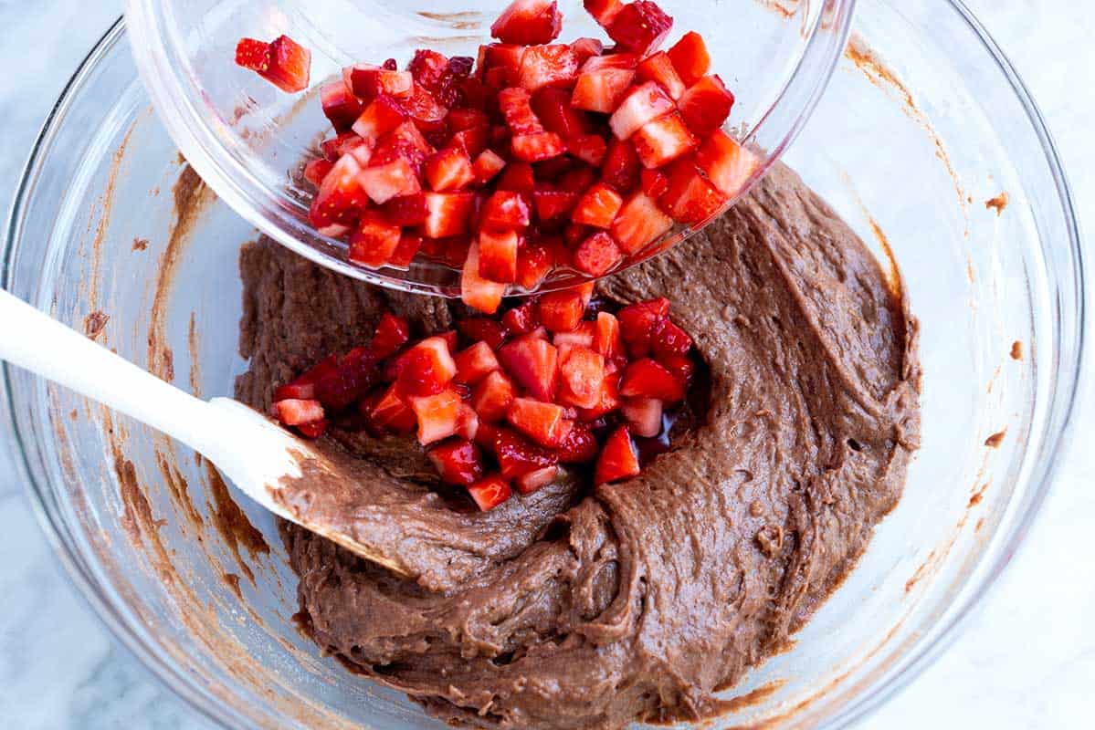 There's no need to beat the batter or use an electric mixer. Over mixing makes muffins heavy. Adding strawberries to the chocolate batter