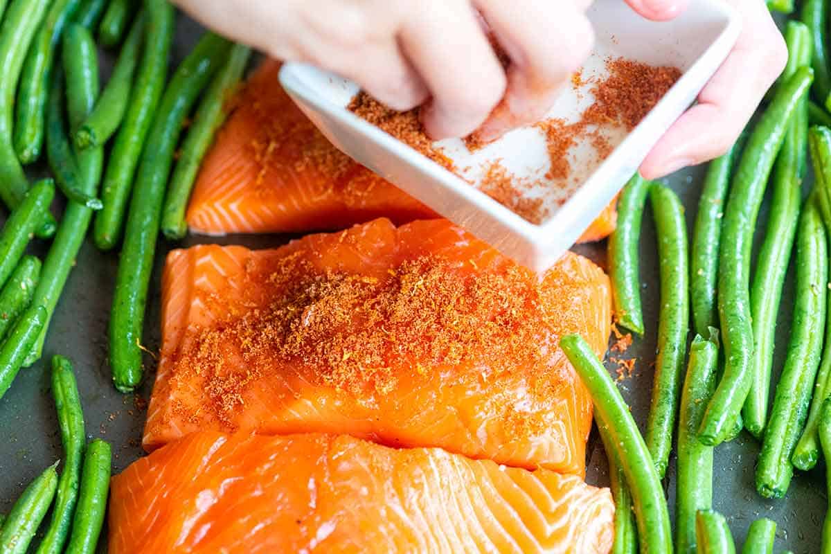 Add Brown Sugar Spice Rub to Salmon Adding Brown sugar rub to salmon fillets