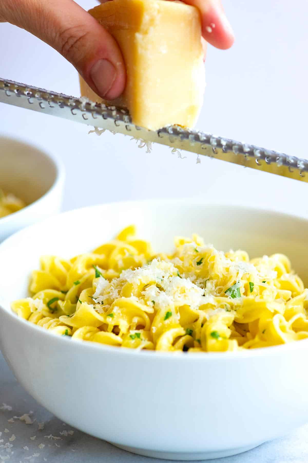 Adding Parmesan to Buttered Noodles