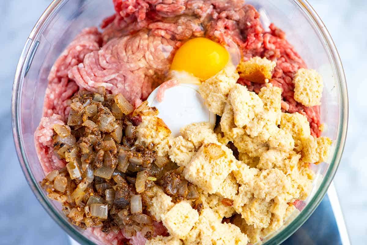 Swedish meatball ingredients in a food processor