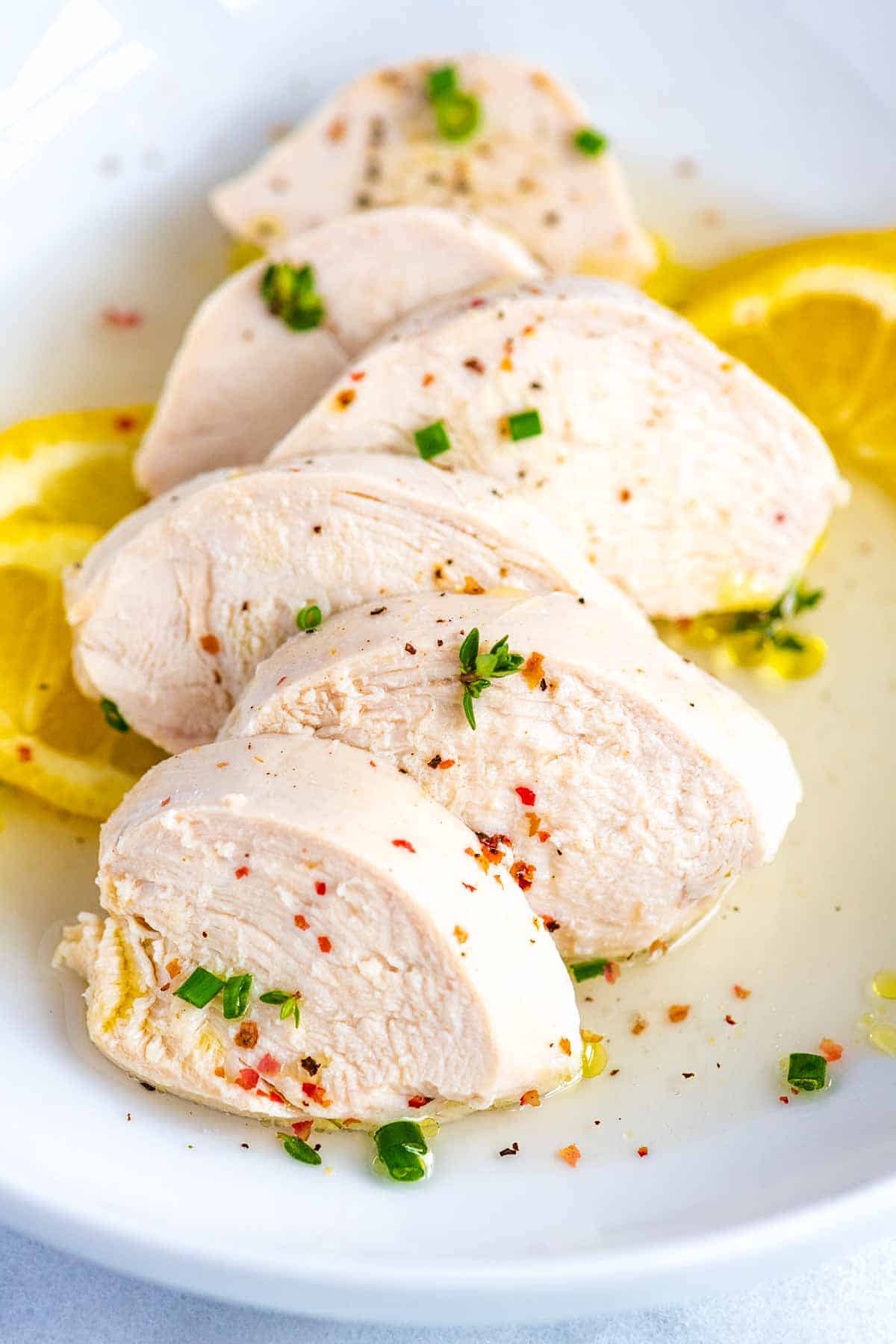 Poached chicken breasts