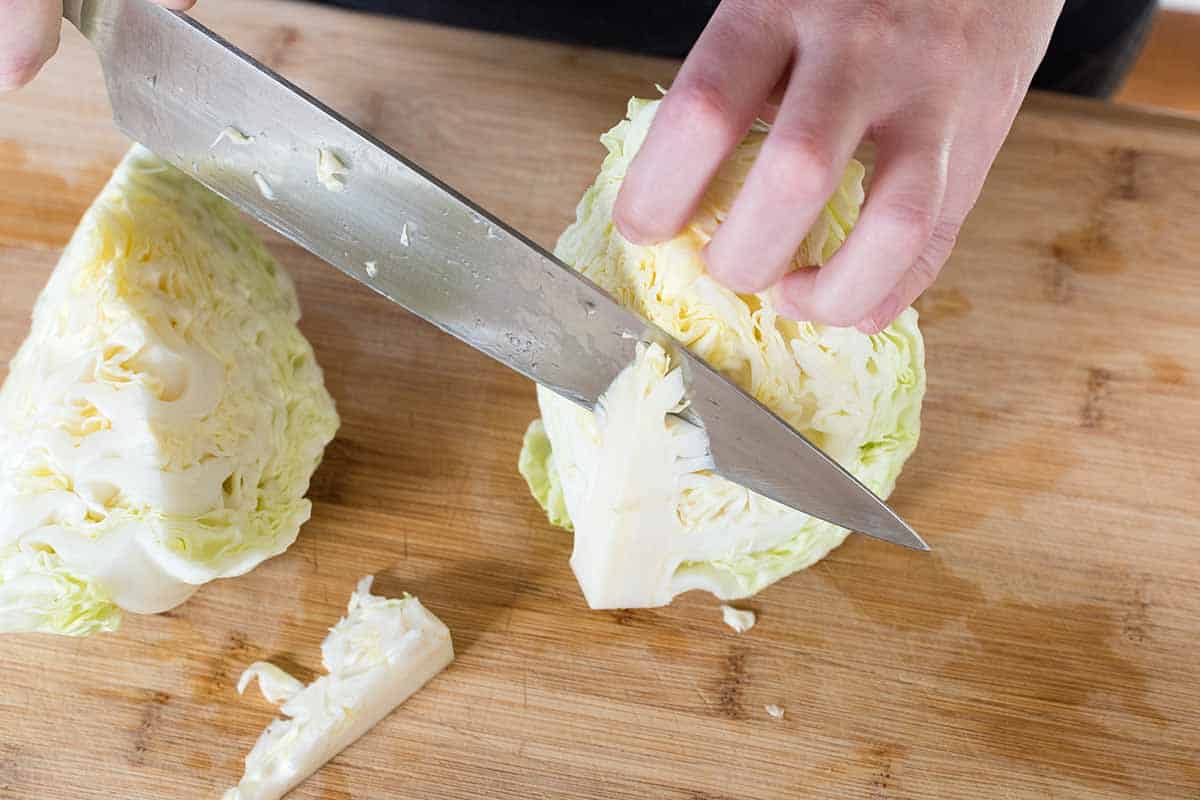 Preparing cabbage for coleslaw - removing the core.