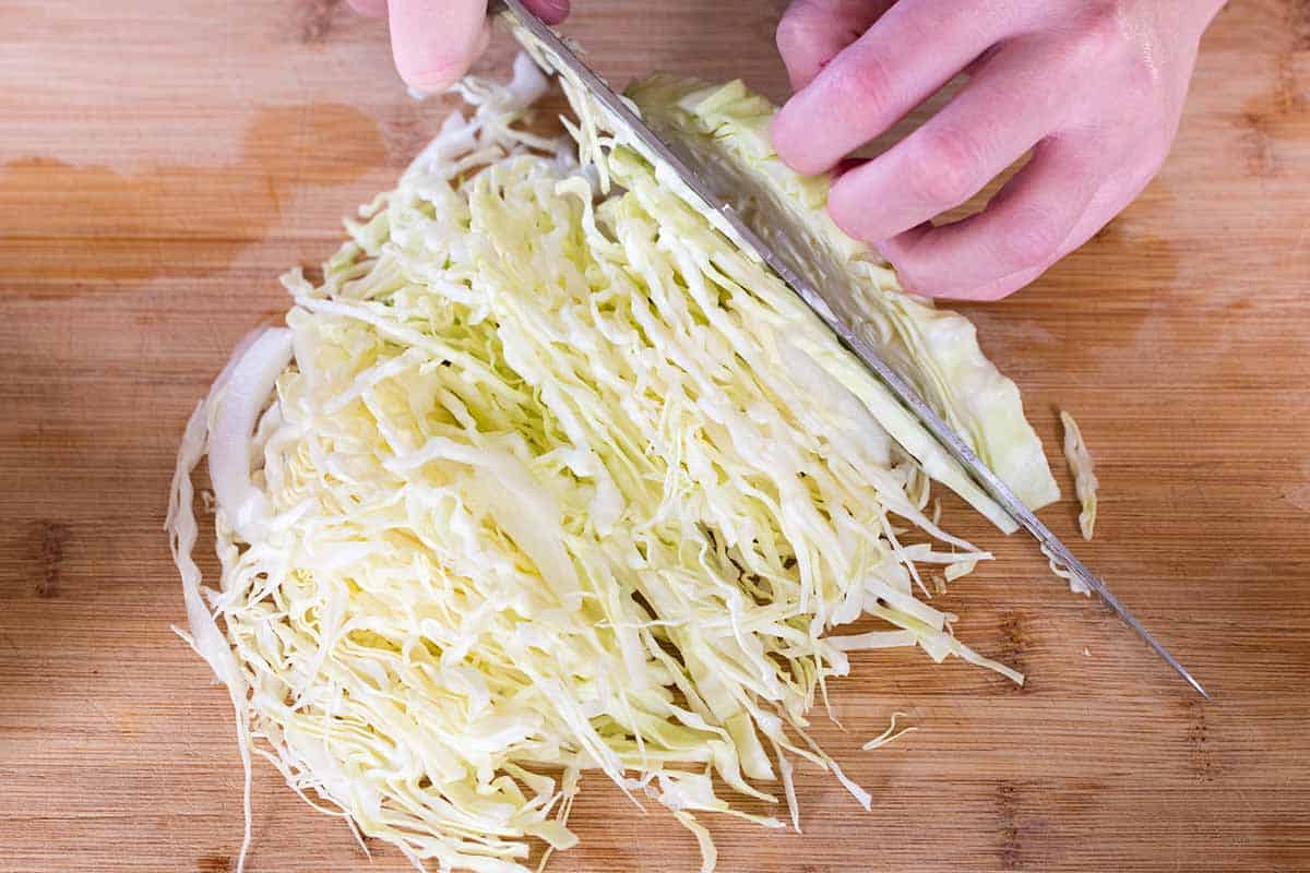 Shredding the cabbage for coleslaw