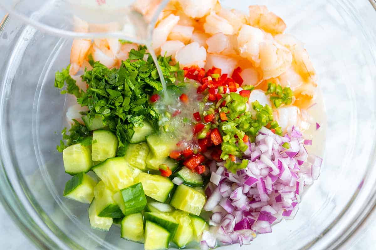 Marinating the shrimp with citrus juices for ceviche