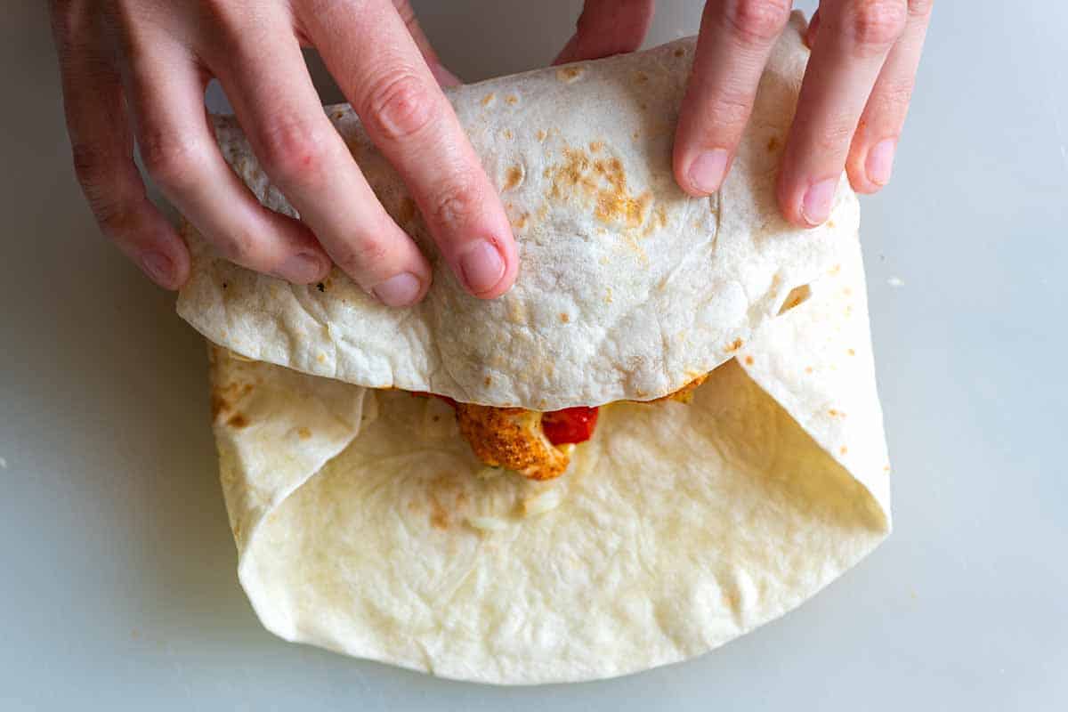 How to Make Veggie Burritos: Folding the burrito step 2