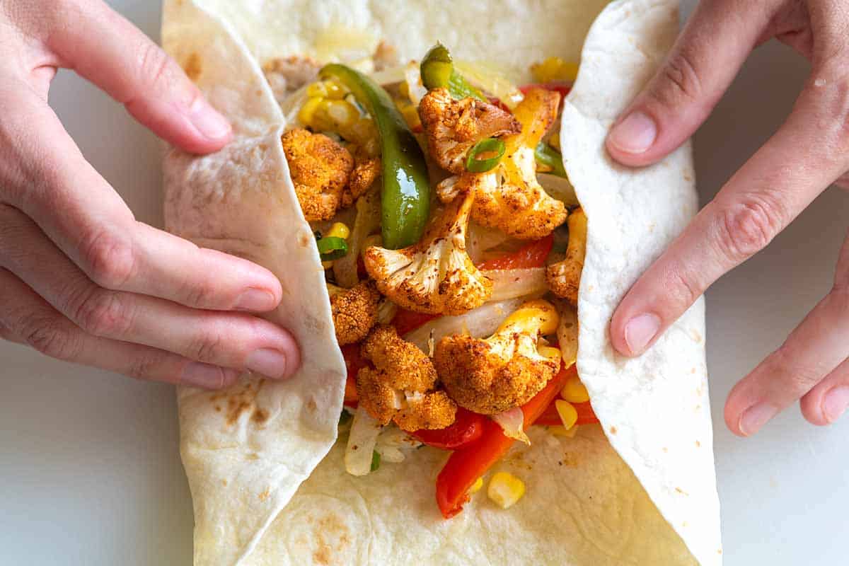 How to Make Veggie Burritos: folding the burrito step 1