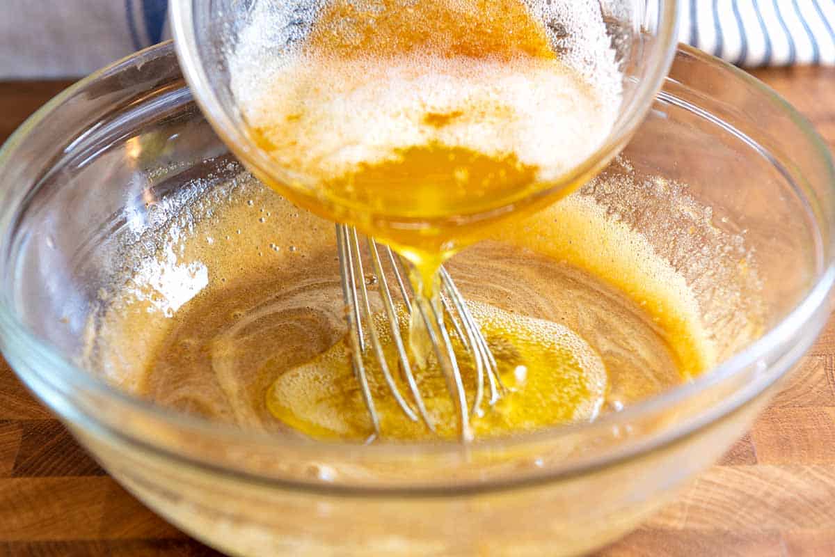 How to Make Chocolate Chip Cookies - Adding melted butter to the other cookie ingredients