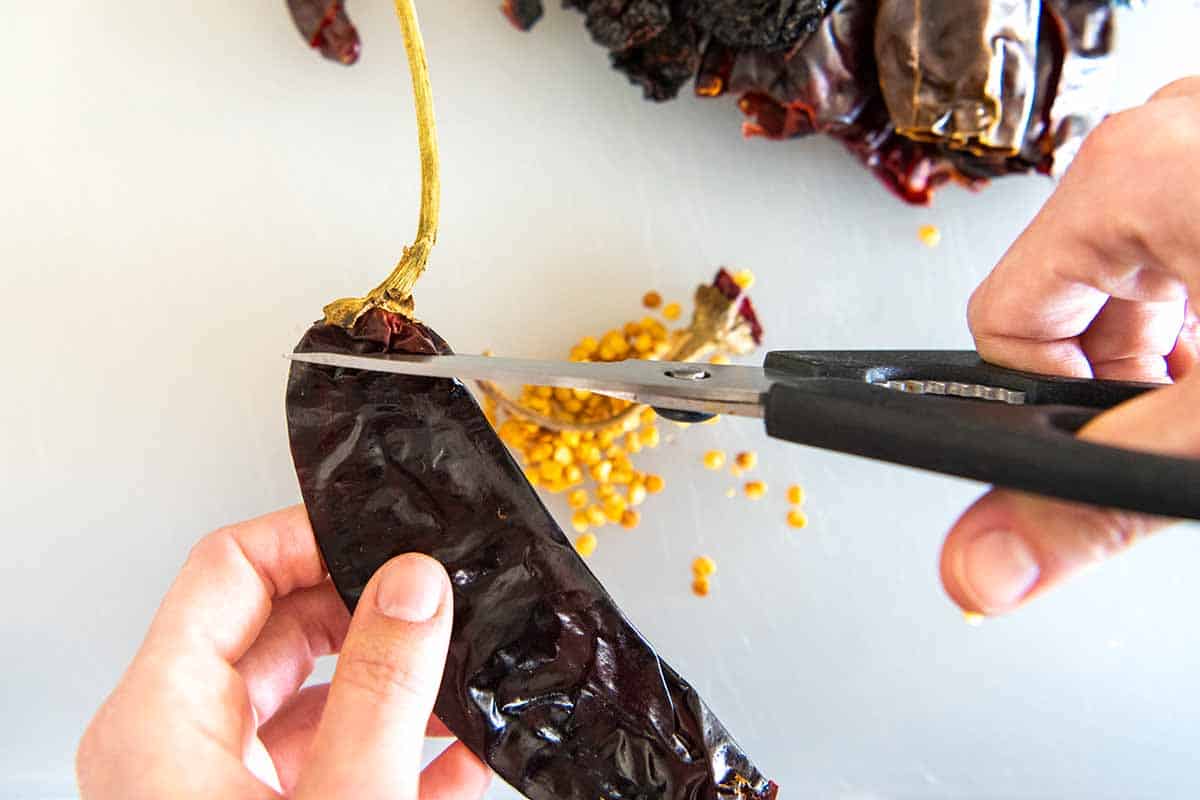 Removing the stem and seeds from peppers