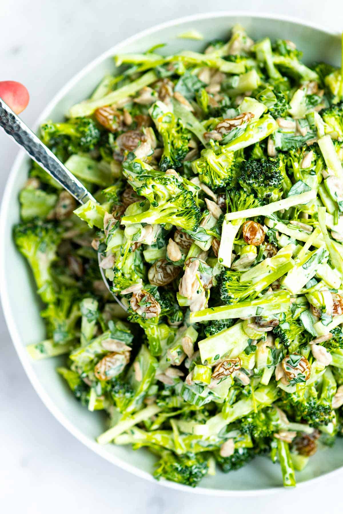 Broccoli slaw with raisins and sunflower seeds