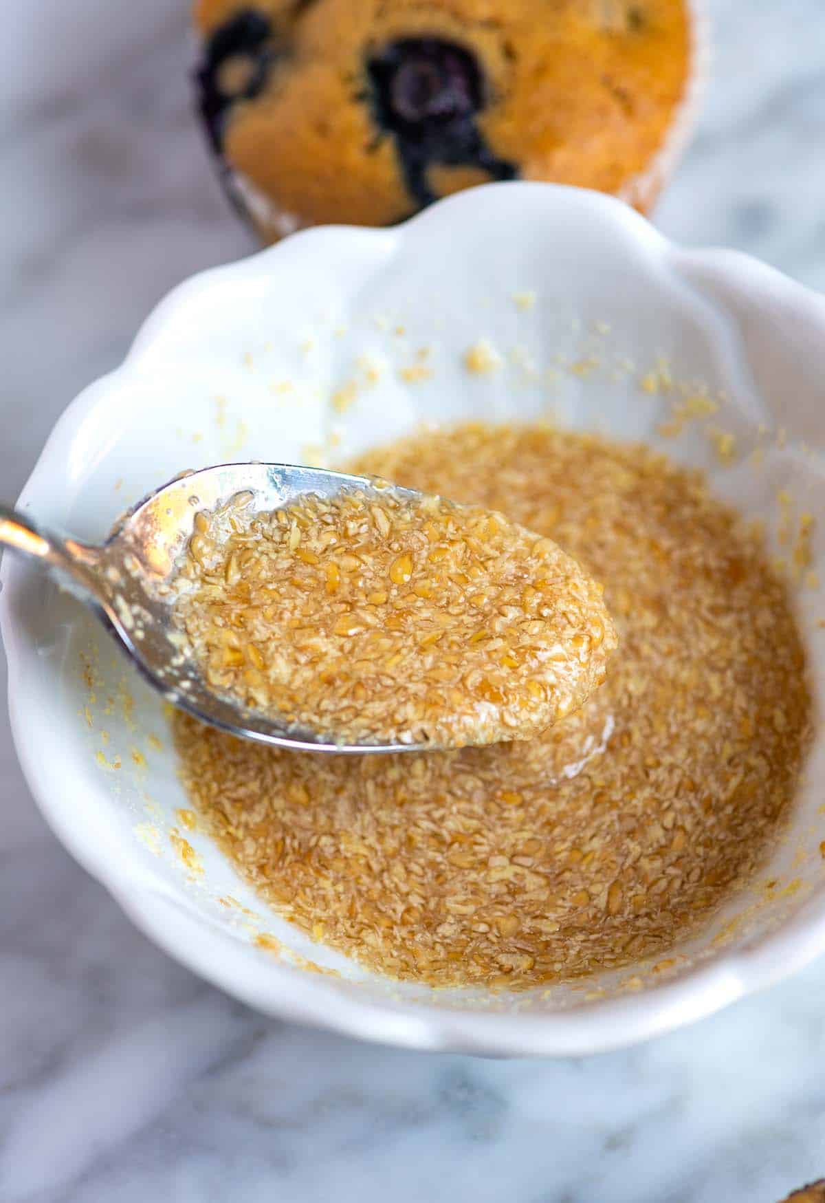 How to Make a Flax Egg: Stirring flaxseed meal with water.