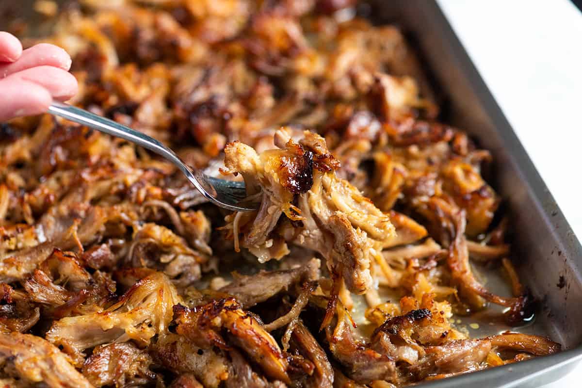 Crispy pork carnitas on sheet pan.