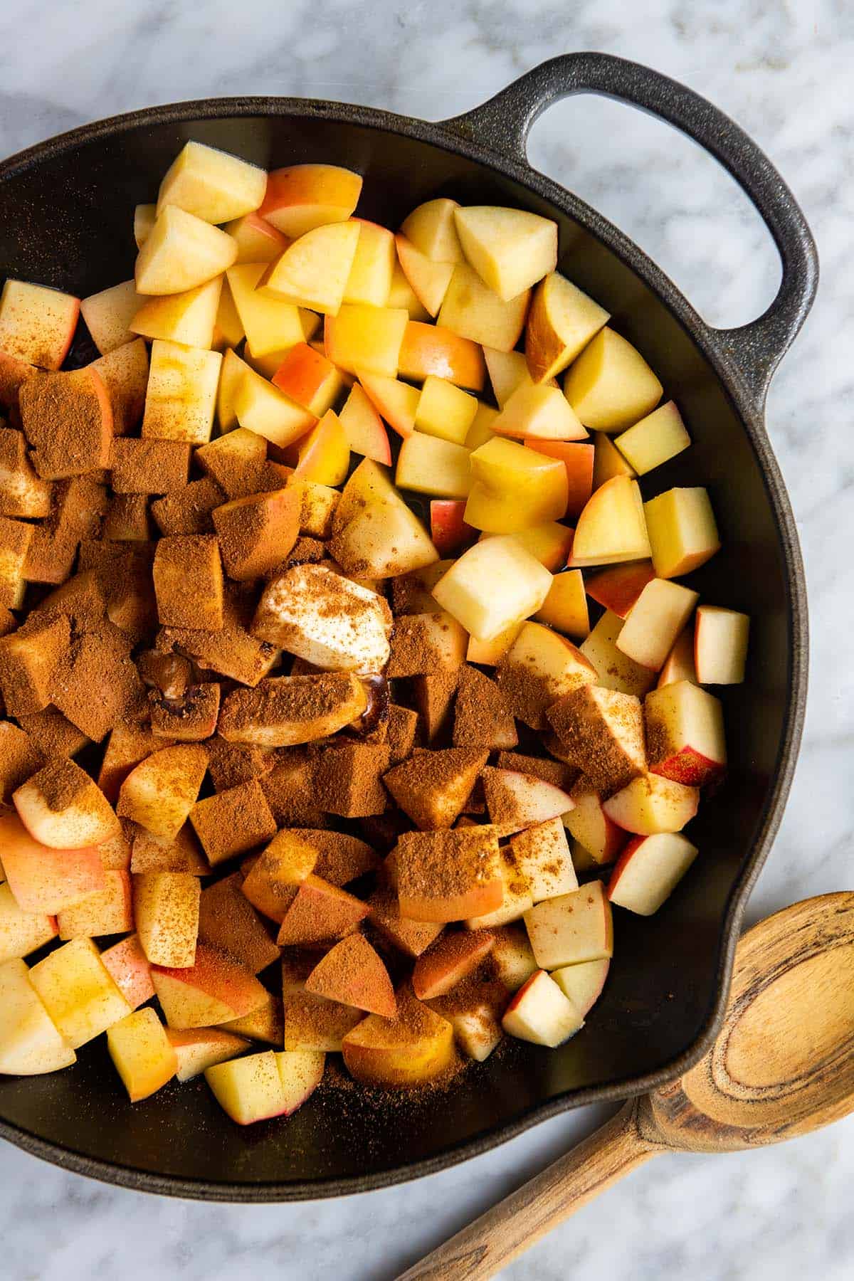 Apples in a Skillet with Cinnamon, and other baking spices.