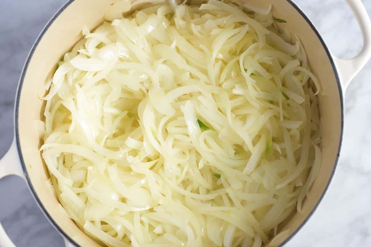 Sweating the onions in the pan with butter.