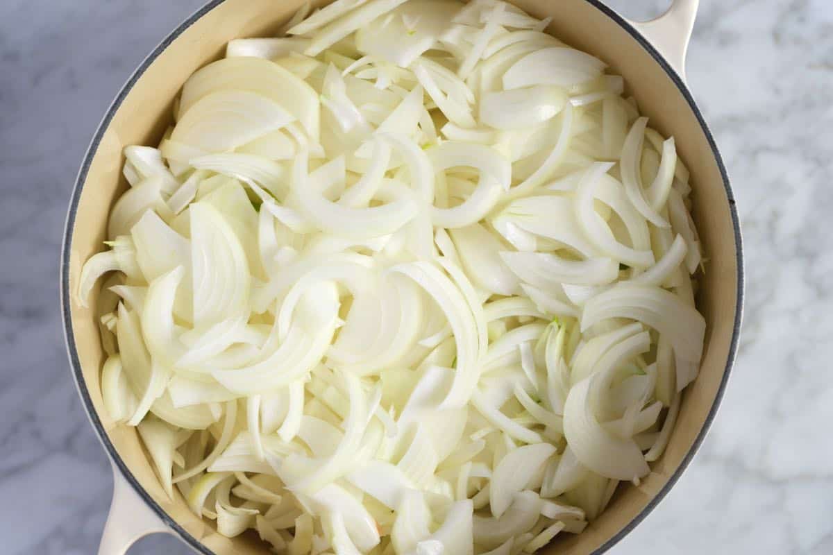 Cooking onions to make french onion soup.