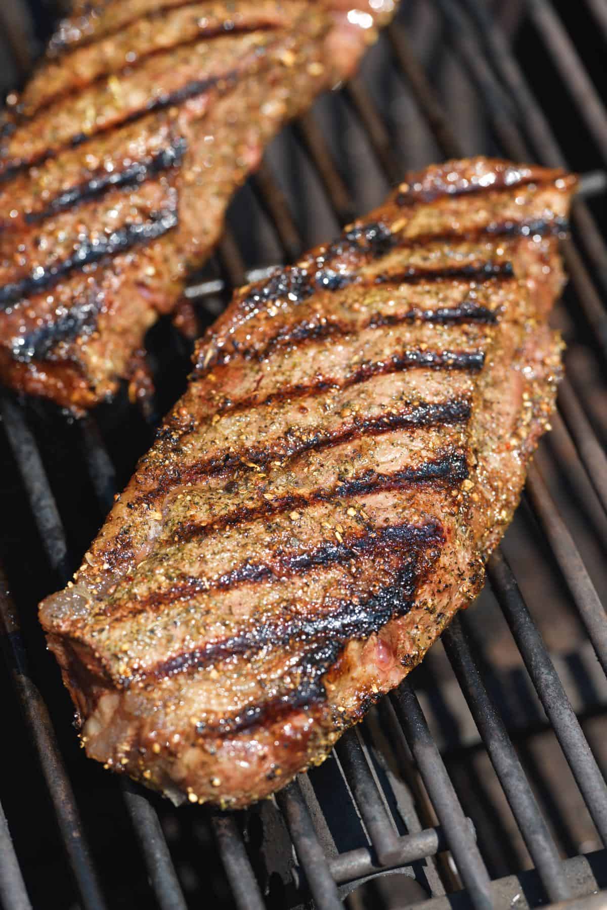 Steaks cooking on the grill