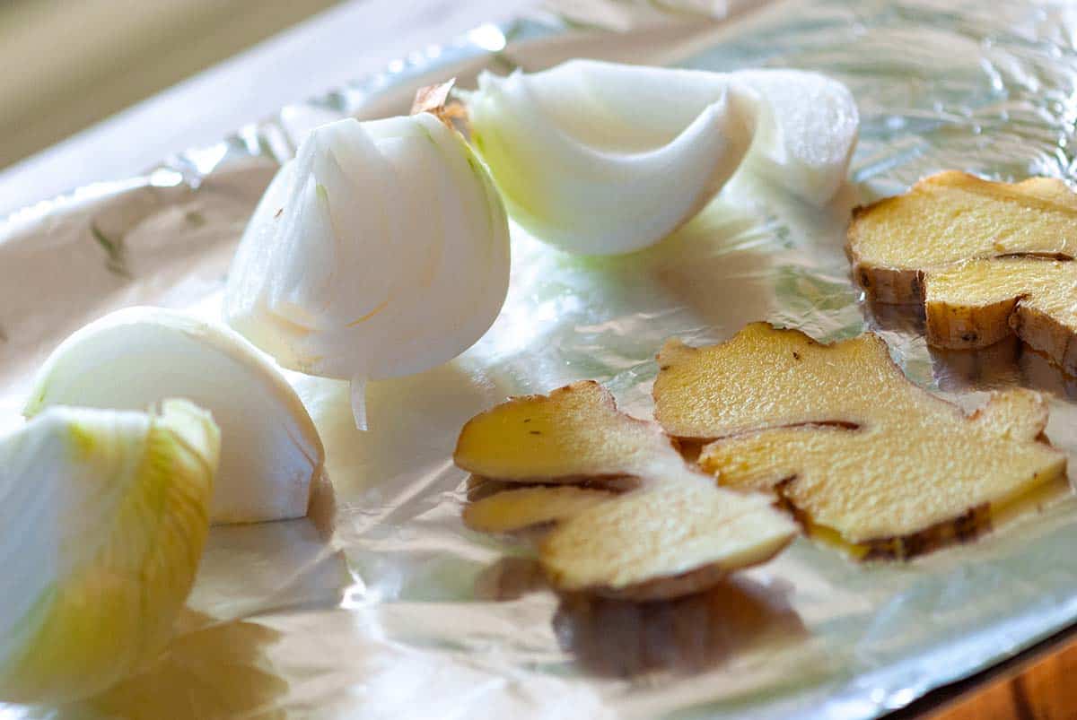 Charring onion and ginger for making pho