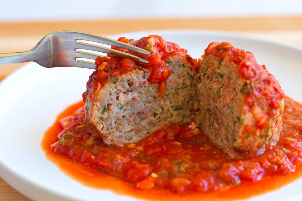 The middle of our Italian meatballs, shows how juicy and tender they are.