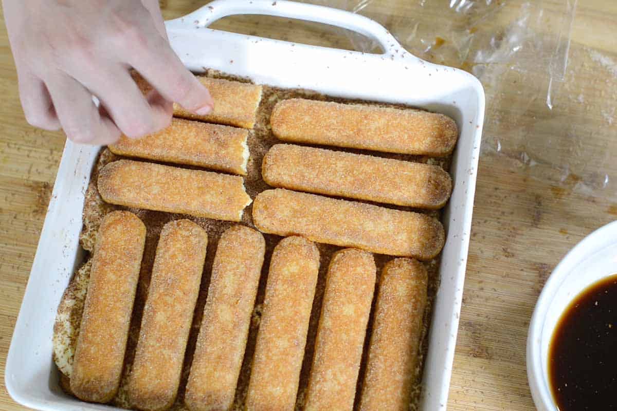 Assembling Tiramisu with ladyfingers